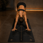 Woman practicing downward dog on the Hot Yoga Mat - Celestial Veil | MIYRA® with sweat-activated grip for non-slip performance.