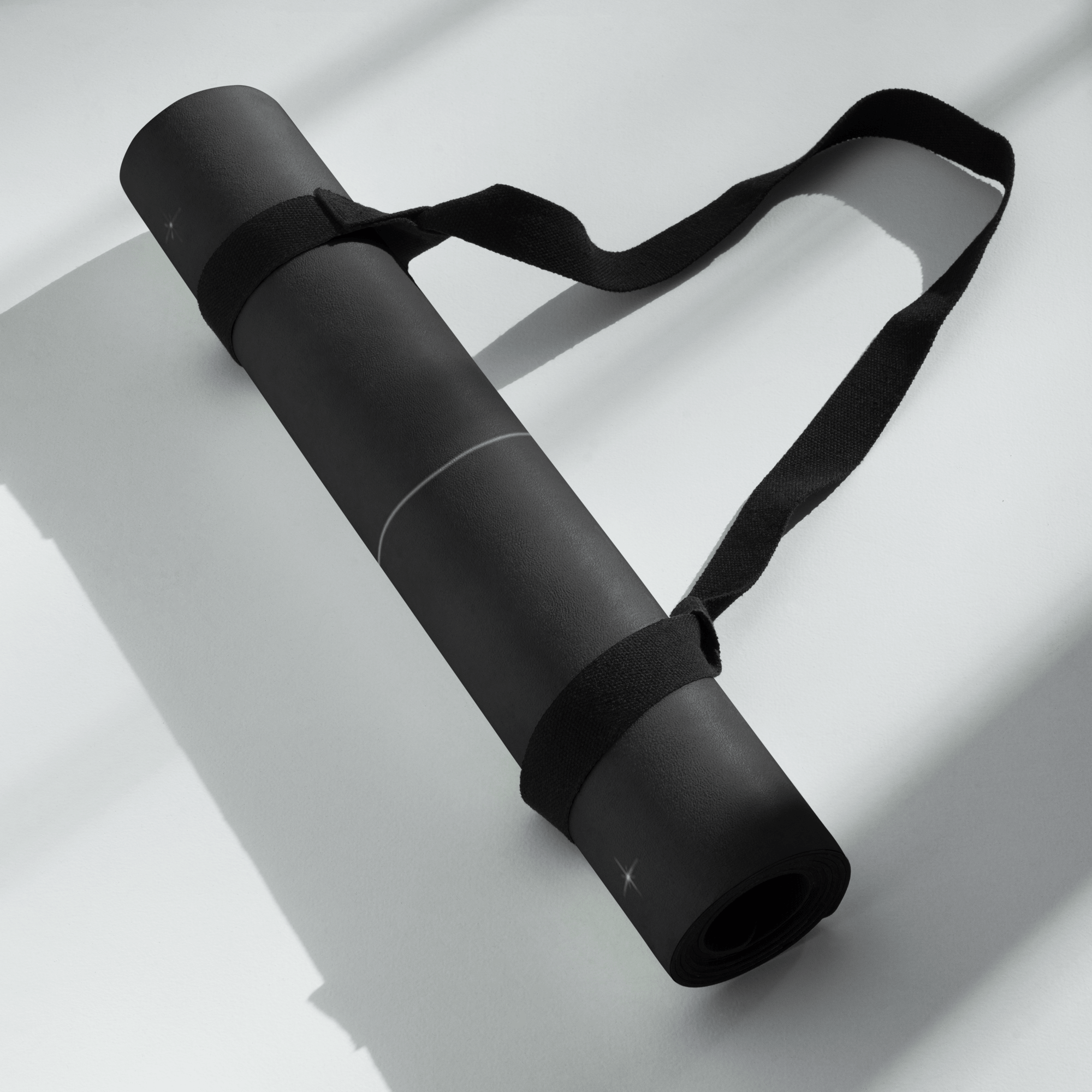 Hot Yoga Mat - Cosmic Stillness | MIYRA® rolled up with a strap, showcasing its portable design for towel-free hot yoga.