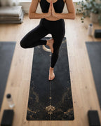 Yoga practitioner in tree pose on MIYRA Hot Yoga Mat | Cosmic Stillness featuring elegant lotus design.