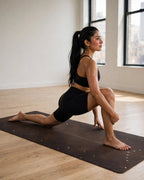 Best Yoga Mat For Hot Yoga in use during a lunge stretch on an Espresso Ivory Moon yoga mat.