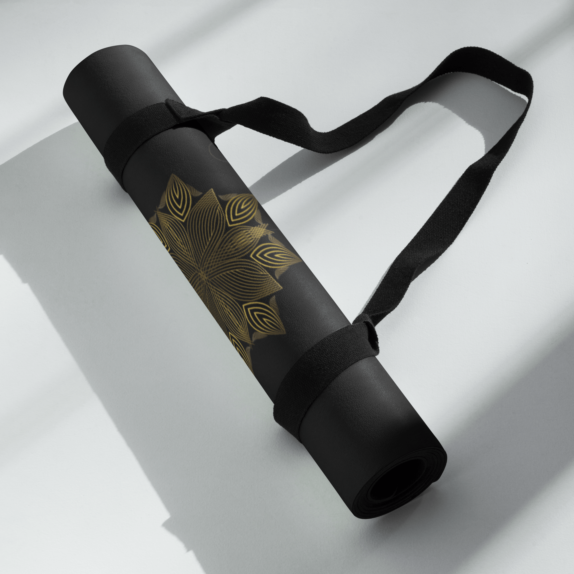 Hot Yoga Mat - Axiom Flow | MIYRA rolled up with strap, featuring a beautiful lotus design on a non-slip surface.