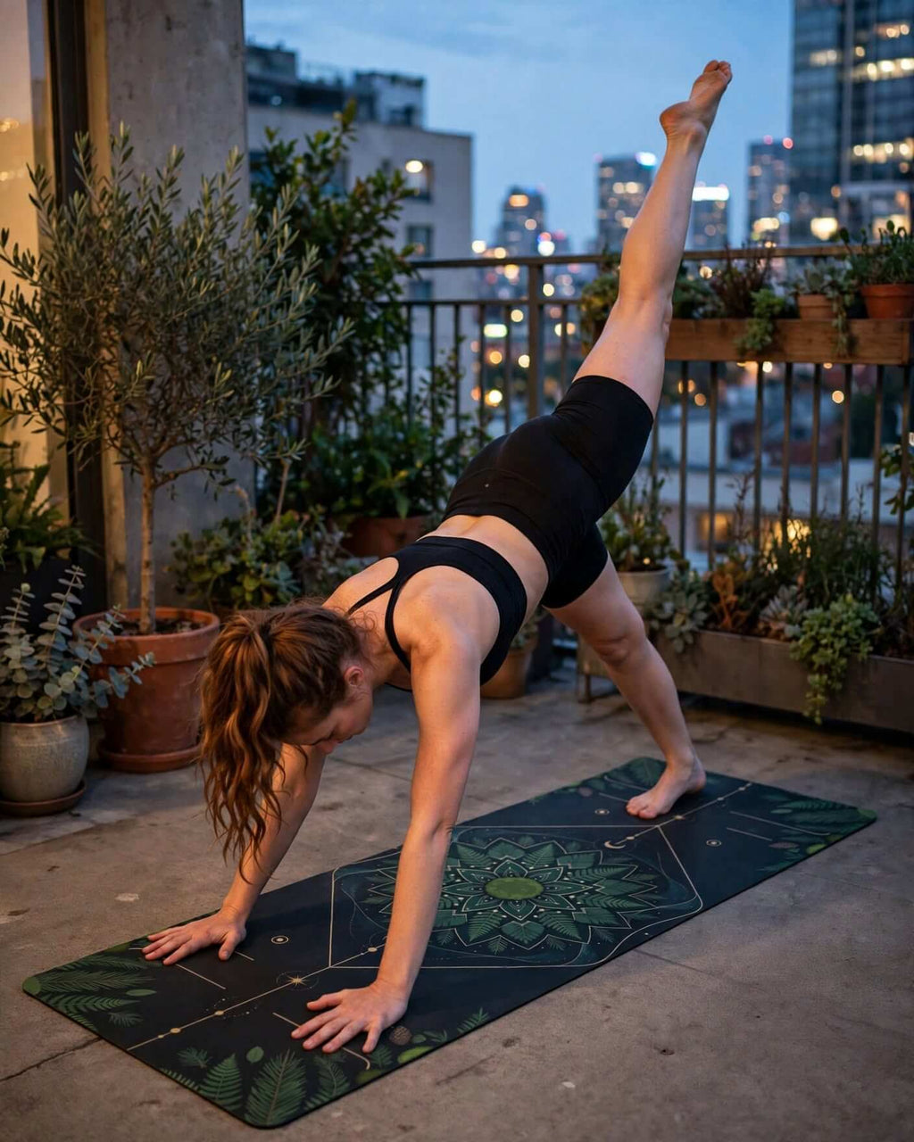 Person practicing on a Hot Yoga Mat - Celestial Forest during sunset on a balcony, showcasing stability and style.