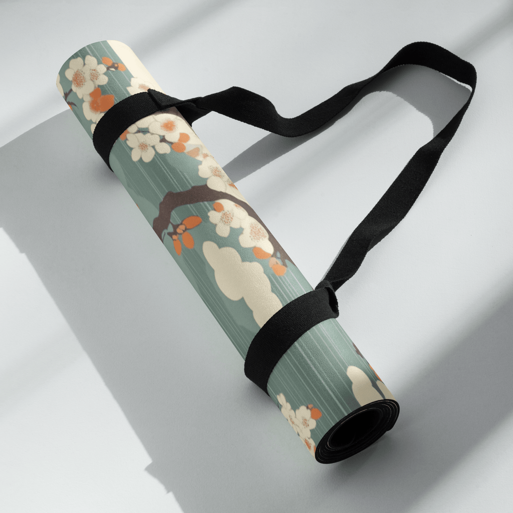 Non Slip Hot Yoga Mat rolled up with a stylish floral design and carrying strap.