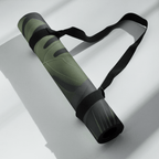 Hot Yoga Mat - Tropical Shadow | MIYRA rolled up with a strap, showcasing its eco-friendly design and vibrant tropical pattern.