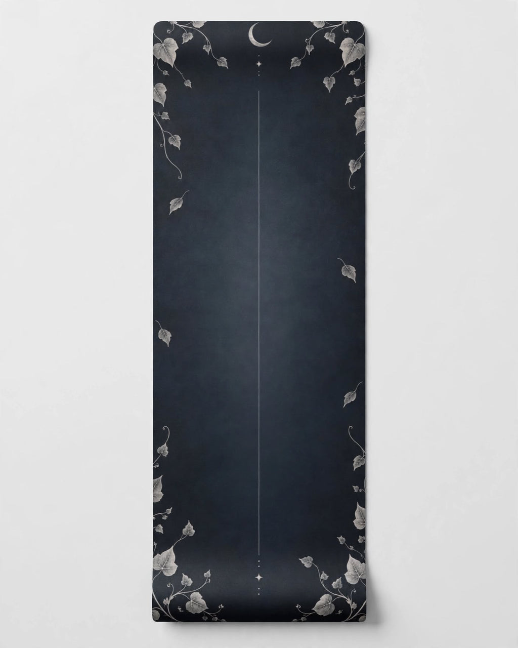 Best yoga mat for hot yoga with a charcoal background and decorative ivy patterns.