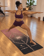 Hot Yoga Mat - Blush Blossom with a woman performing yoga in a studio, showcasing stability and style.