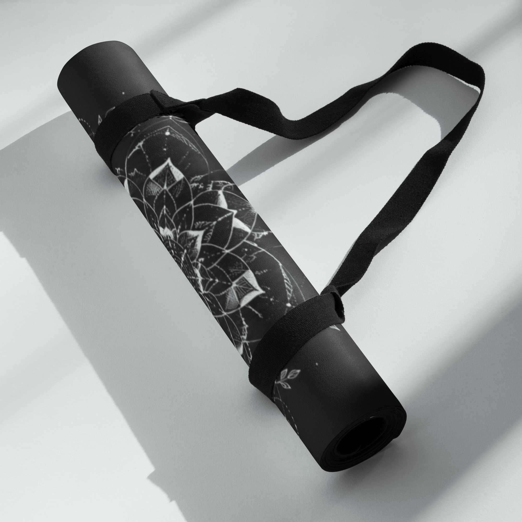 Hot Yoga Mat - Dark Halo | MIYRA® rolled up with a strap, showcasing the stylish design and natural rubber base.