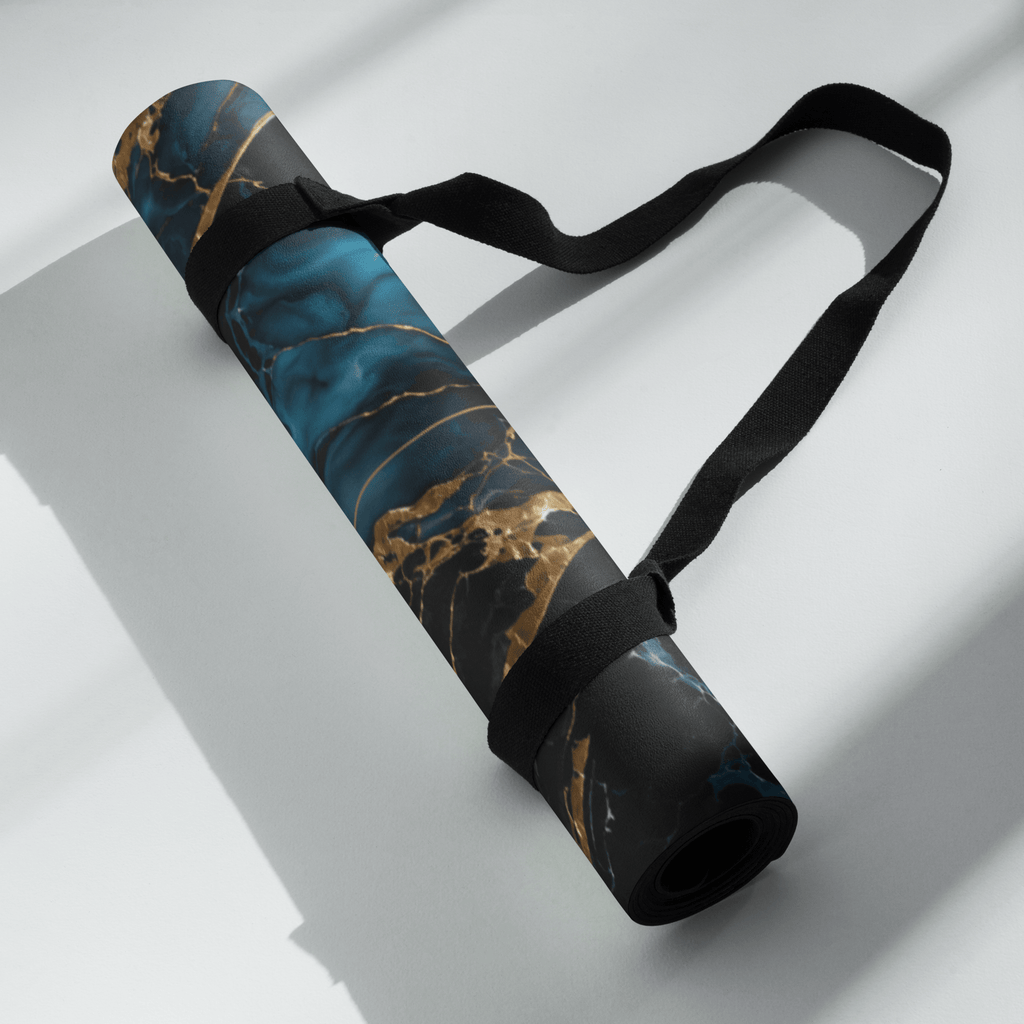 Hot Yoga Mat - Blue Ember | MIYRA® rolled up with carry strap, featuring a stylish blue and gold design for towel-free hot yoga.