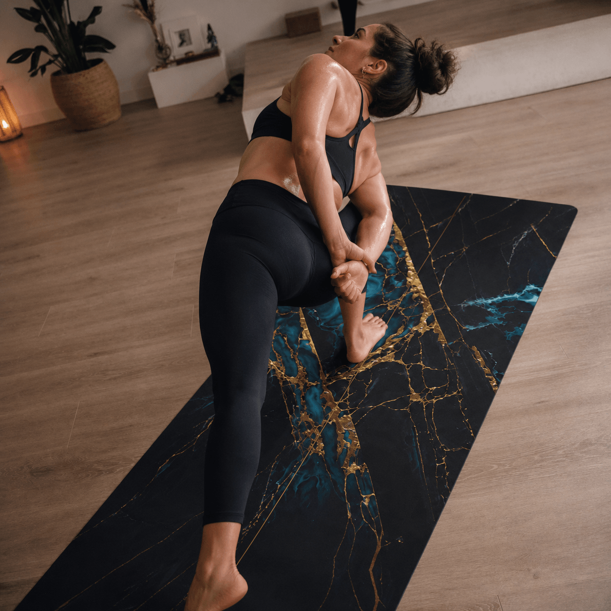 Woman practicing yoga on a Hot Yoga Mat - Blue Ember | MIYRA® designed for stability and sweat-activated grip.