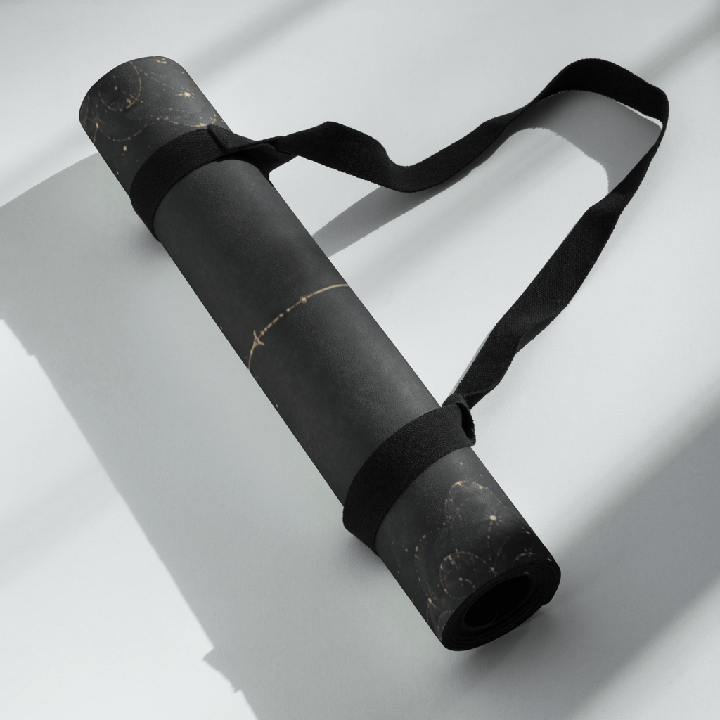 Hot Yoga Mat -Nocturnal Flow | MIYRA® rolled up with a strap, showcasing its sleek design for easy transport.