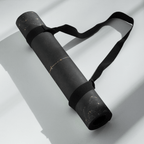 Hot Yoga Mat -Nocturnal Flow | MIYRA® rolled up with a strap, showcasing its sleek design for easy transport.