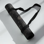 Best yoga mat for hot yoga non slip hot yoga mat rolled up with cosmic design and carrying strap.